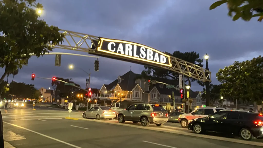 The Carlsbad welcome sign arching over Carlsbad Boulevard in downtown Carlsbad