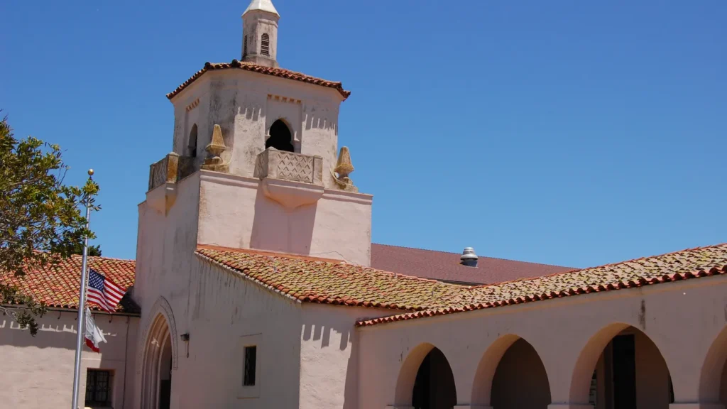 Guadalupe City Hall, a Spanish-style building with a bell tower and arches