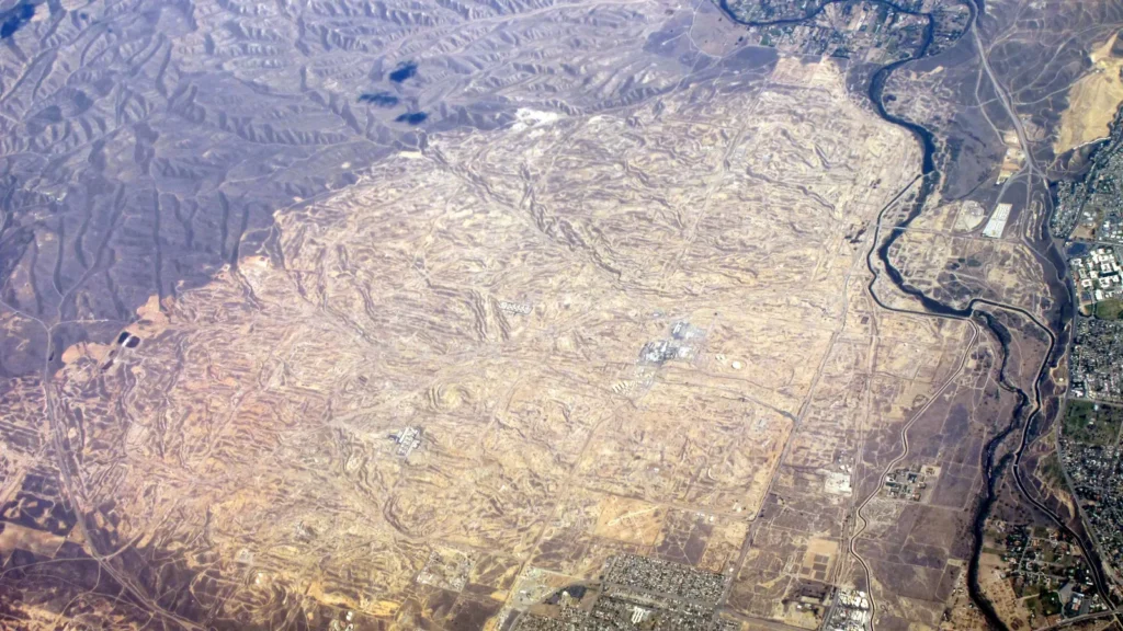 Aerial view of the Kern River Oil Field and the Kern River on the edge of Oildale, California