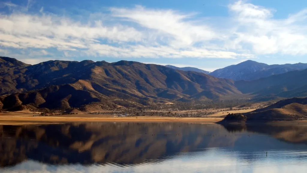 Lake Isabella reflecting the surrounding mountains