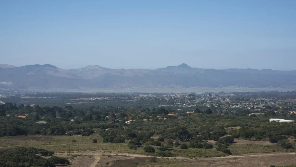 Lompoc and the Lompoc Valley seen from the hills, with mountains behind