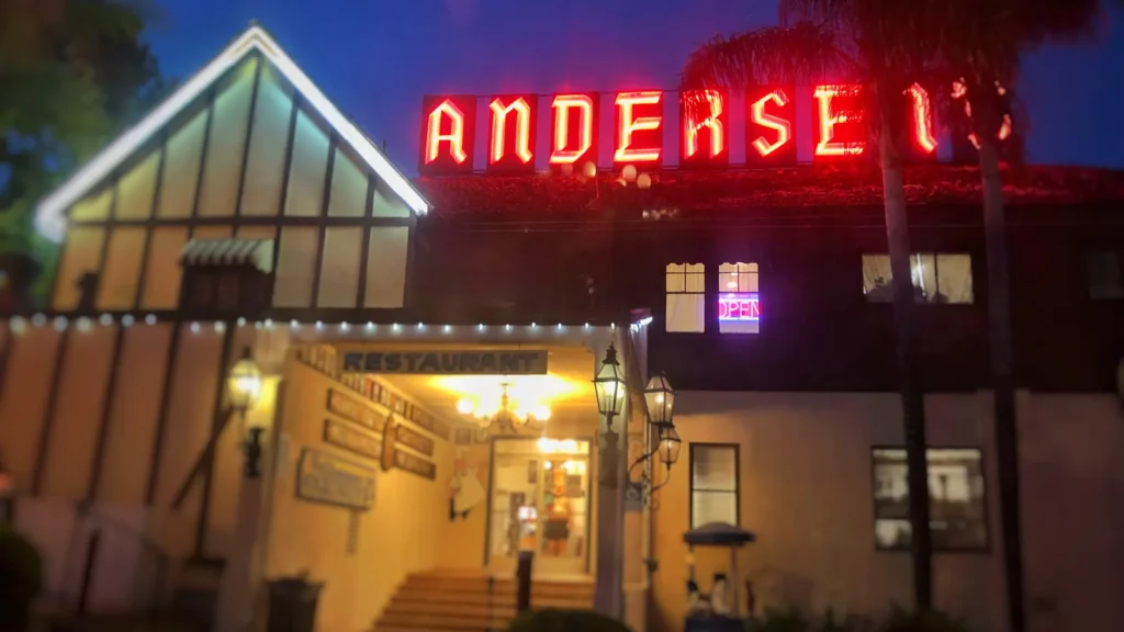 The lit sign of Pea Soup Andersen’s restaurant in Buellton at night