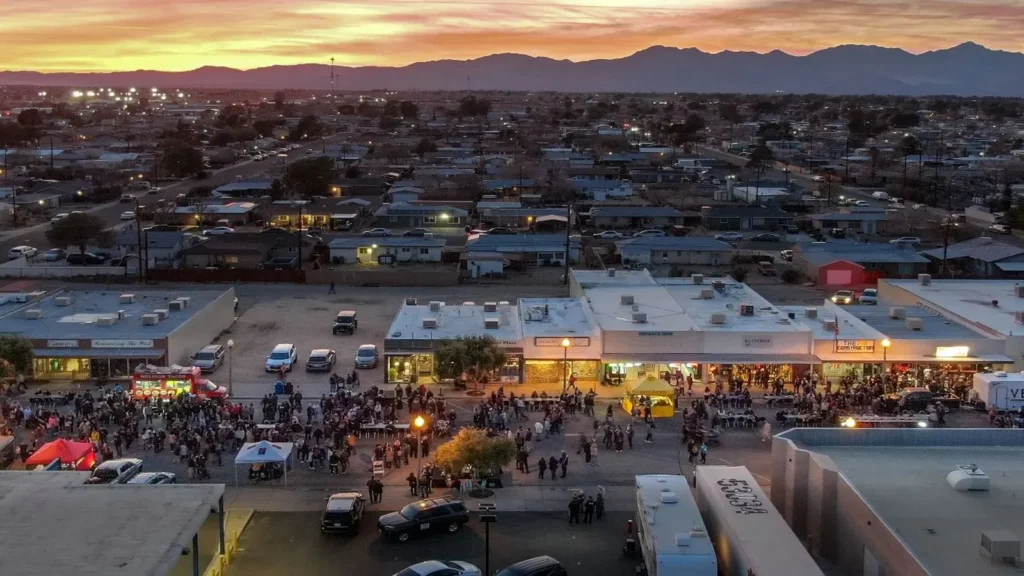 A view over Ridgecrest at sunset, with mountains on the horizon