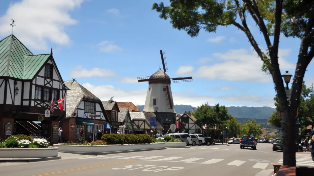 A Solvang street of Danish-style buildings with a windmill
