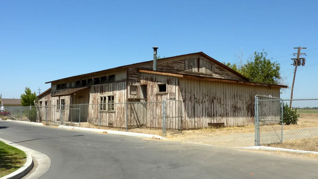 Wooden community hall of the historic Weedpatch Camp near Arvin, California